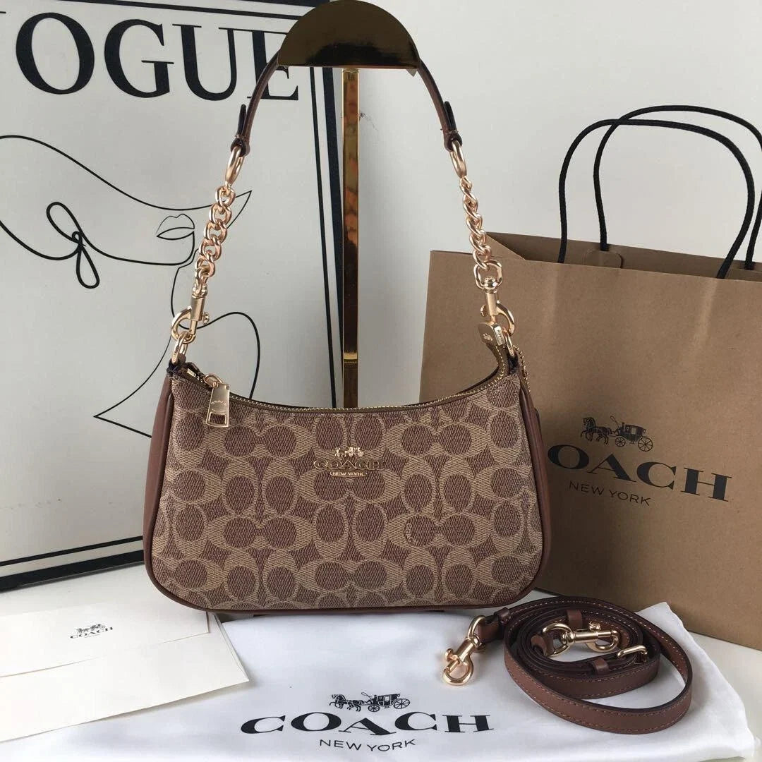 Coach Teri Shoulder Bag in Signature Canvas (Brown / Black - Style Code: CV933)